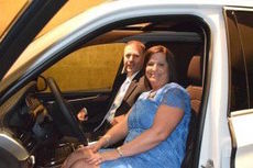 Suzanne Koty was handed the keys to a Greer-produced 2015 mineral white metallic BMW X5 xDrive35i she will drive throughout South Carolina as the state’s public education ambassador.
 