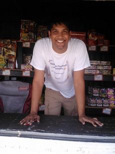 Des Boodram runs the fireworks stand with Vernon Rutland at Hwy. 290/Locust Hill Road across from Ingles.