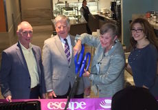 GSP President/CEO Dave Edwards, commissioners Leland Burch and Minor Shaw, and Rosemarie Andolino, MAG USA CEO and President cut ceremonial ribbon to open the Escape Lounge.
 