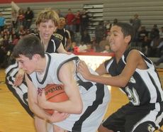 Greer players trap a Bryson player in the corner in the final seconds of today's game trying to create a turnover.