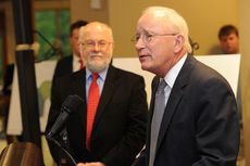 William Hyslop, President and CEO of MD Anderson Physicians Network, talks to the invited guests at the groundbreaking ceremony for the Gibbs Cancer Center at Pelham. Dr. William Murphy, board chairman of MD Anderson Physicians Network, is to the side.
 
 