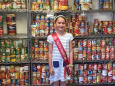 Abby helped collect 920 items for the Greer Soup Kitchen and $200. 
 