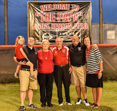 The Henson family celebrated the naming of Jerry Henson Field with Trent Henson, left, Mr. and Mrs. Jerry Henson, middle, and Mr. and Mrs. Travis Henson, far right.
 
 