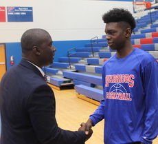 Justin Woodberry was introduced Monday as Riverside's new basketball coach.
 