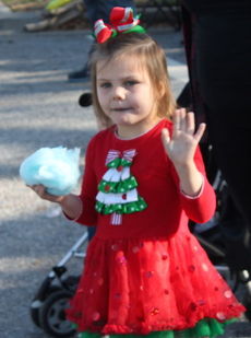 What can be better than waving to Santa Claus and enjoying cotton candy during a parade?
 
 