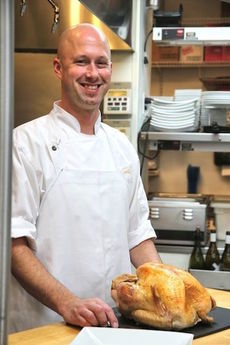 Jason Clark, owner of Greer's BIN 112, demonstrates how to carve a turkey in an easy step-by-step presentation.
 