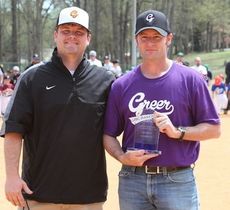 Jason Davis, right,  won the Speedy Gregory award for his service to youth sports in Parks and Recreation. Cory Holtzclaw, left, makes the presentation on opening day.
 
 
 