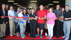 Dedication ribbon cutting for the Angie and Sam Kelly (center) Strength and Conditioning Center at North Greenville University.
