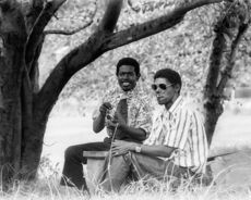 DC and McGee, boyhood friends, were photographed by Perry Williams more than 40 years ago under the crabapple tree at the old Greer High School.
 