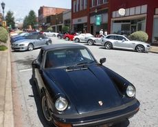 This Porsche slipped into town at the most unlikeliest time on Trade Street  drawing some stares and comments. Actually the owner was picking up his father at a downtown store.