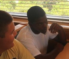 As a senior, Quez made his final visit to the Clock restaurant during Camp Swarm in August. He noticeably is sitting next to a lineman.