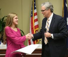Kate Ambrose honored for winning state cross country championship