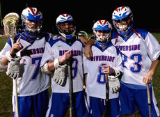 Riverside lacrosse players signal they beat J.L. Mann Thursday at the Reservation.
 