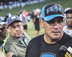 Ron Rivera tackles media questions after the first day of camp Thursday.
 