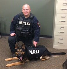 Stryker with Officer James Compton.
 
 