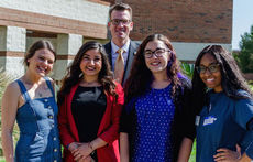 Pictured is Dr. Brandan Kelly, Chancellor at the University of South Carolina Upstate, and some staff members of the newly designed newspaper – The Carolinian. Left to right are Zandra Shafer, Stephanie Sawaked, Editor Lucy McElroy, and Asia Suber.
 
 