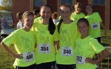 Cate Ambrose, Abigail Smith, Caroline Rogers, and Sarah Fryer competed in the iMove 5K at Riverside Middle School.
