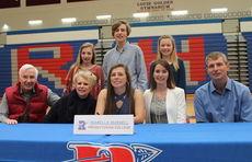 Isabelle Russell's signing with Presbyterian included, left to right, Barry and Judy Clough, grandparents, and parents, Richard and Stephanie. Siblings Anne, Dylan and Maria are in the back row.