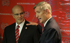 Carroll McCray is introduced by NGU President James B. Epting as the new head football coach.