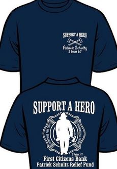 Custom T-shirts that include the logos of both of Patrick Schultz’s fire departments are for sale with proceeds helping with medical and family expenses.
 