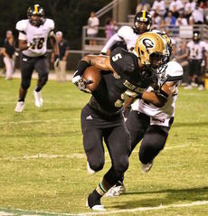 Troy Pride (5) breaks away from a Union County defender for Greer's game-winning touchdown.
 
 