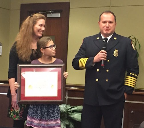 City of Greer Fire Chief Dorian Flowers was honored at Tuesday’s Greer City Council meeting for completing the Executive Fire Officer Program offered by FEMA'S National Fire Academy. Joining Flowers is his wife, Michelle, and daughter, Leah.
 
 