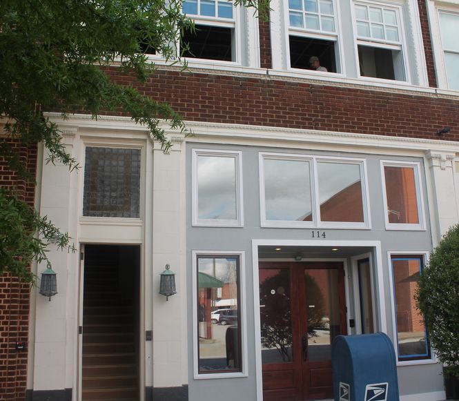 An insurance agency will occupy 114 Trade Street, between BIN112 and former Bank of Greer. Some space will be leased to other small businesses.