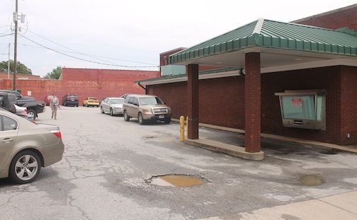 Alan Fore´ plans to enclose the parking lot surrounding his property at 117 Trade Street. The Greer Board of Architecture Review will hear the request at 10 a.m. Tuesday at City Hall.