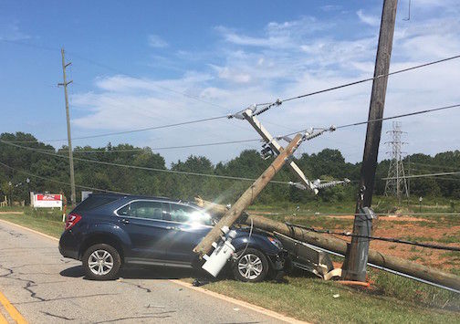 A vehicle hit a power pole that brought down power lines on Brushy Creek Road Wednesday.
 