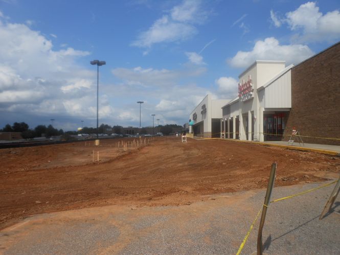 The building permit for the $768,500 upfit of the Greer Plaza and Walmart Neighborhood Market façade has been filed with the city. Work has begun on the Greer Plaza parking lot and facade work is getting underway.