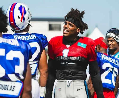 Cam Newton enjoys making smack talk during Panthers-Bills joint camp at Wofford College Tuesday.
 