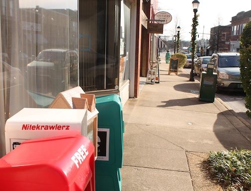 Sidewalks, curbs, gutters and crosswalks will be among topics for discussion for the community master plan. Abandoned and outdated newspaper vending machines create an eyesore in front of vacant buildings on both sides of Trade Street.