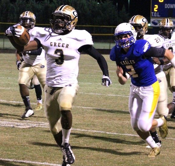 D'Anta Fleming heads for the goalline to score one of his three touchdowns Friday night in a 48-7 win over Eastside.