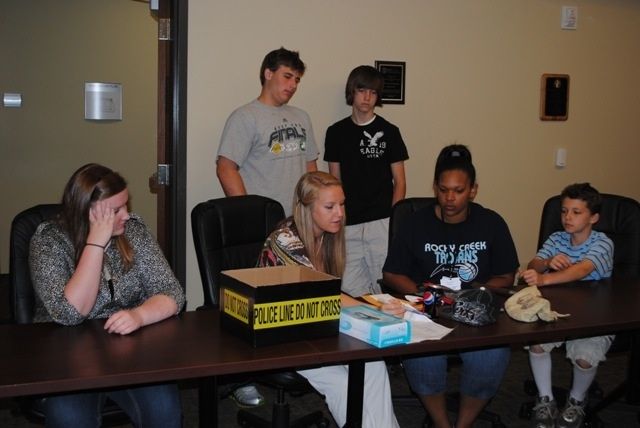 Students attending the CSI: Camp at the Greer Police Department learned how to gather and document evidence at a crime scene.