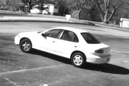 Another view of a a white Chevrolet Cavalier reportedly used in a bank robbery last Friday.
 