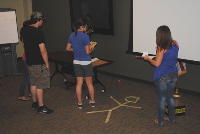A body is portrayed as a crime scene for students at the CSI: Camp. Angie Childers and Lt. Jim Holcombe are the moderators for the inaugural camp.