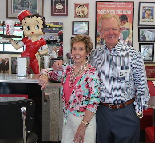 Jim Benson his wife, Evelyn, at the Benson Automotive Memory Lane, which houses his antique car collection,
 