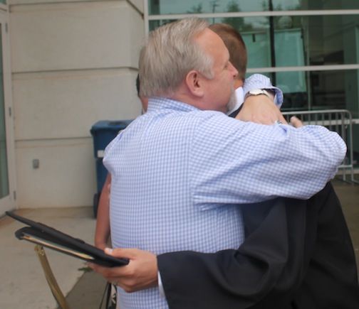 Perhaps there was nothing more priceless for Bill Searcy than to give his son, Chandler, a strong hug outside the Bi-Lo Center after graduation ceremonies.