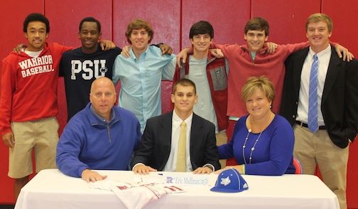 Friends and teammates join Eric Mullinax at the signing ceremony.
 