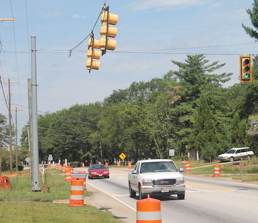 Orange barrels mark Locust Hill Road as construction nears for relocating Mountain View Road into a 90-degree intersection at Locust Hill Road.
 
