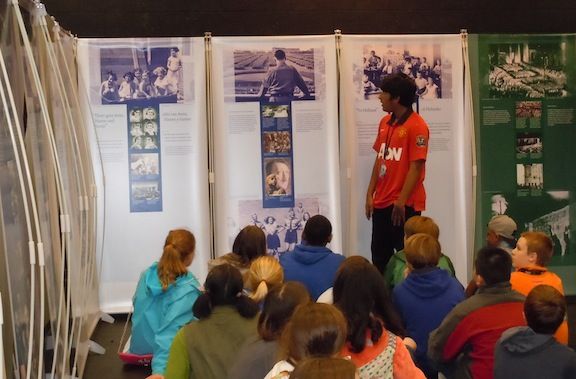 Jay Ramesh, a student docent at Riverside Middle School, leads his class through a tour of the Anne Frank exhibit currently on display at Riverside Middle School. 