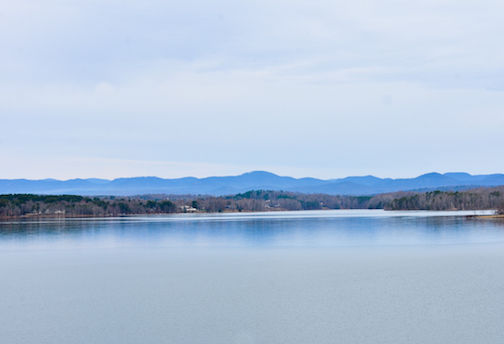 The serene beauty of Lake Robinson with the Blue Ridge mountains in the background.
 
