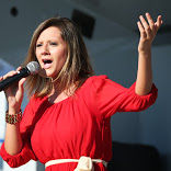 Lauren Waynick joins 11 Greer Idol singers in round two on Friday night at the Greer City Amphitheater.