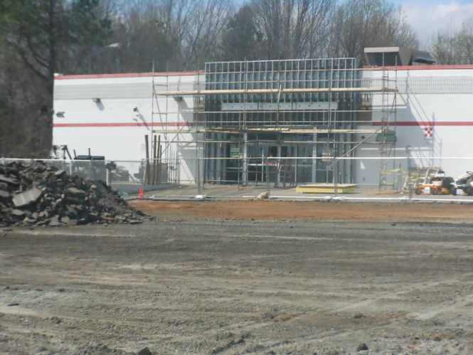 Tractor Supply's old facade has been taken down and is within a month of having its new one showcasing the company located next to Kohl's. The parking lot in front of Tractor Supply is scheduled to be completed in April.