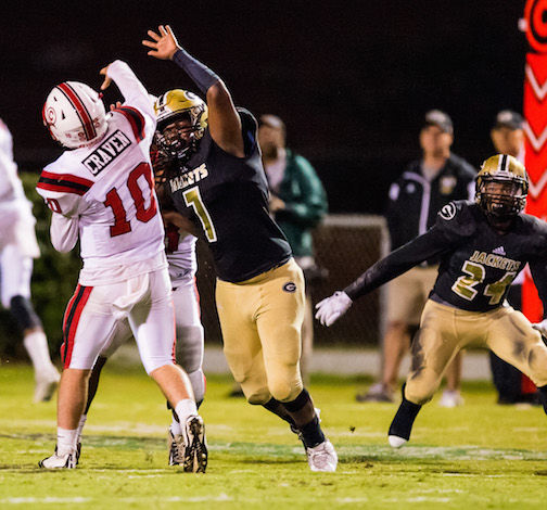 Travigea Ware (7) of Greer was part of the smothering defense that kept Charlie Craven off balance.
 