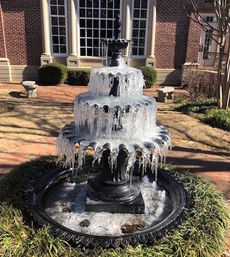 Sub-freezing temperatures made this fountain into an ice sculpture.
 
 