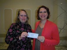Kendra Kemp, president of the Greer Jaycees, presented a $1,000 check Thursday  to Caroline Robinson, Executive Director of Greer Relief. The proceeds were from the 2011 Jaycees Christmas Parade.