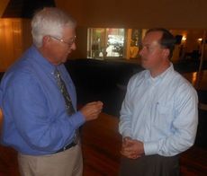 Jerry Balding chats with Skip Davenport of D&D Motors after the forum for Greer CPW Commissioner candidates at Grace Hall