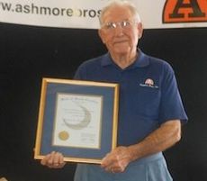 A prolonged standing ovation greeted Russell Ashmore, Jr., upon his being presented the Order of the Silver Crescent this afternoon at the company's annual Labor Day BBQ Picnic.
 