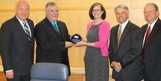 Jennifer Satterthwaite, Public Information Coordinator for the SC Energy Office, presented Greer CPW an award for advancement of of alternative fuel usage. Receiving the honor, left to right, are: commissioner Perry Williams, City Gas Manager Bob Rhodes, Satterthwaite, commissioners Jeff Howell and Eugene Gibson.
 
 
 
 